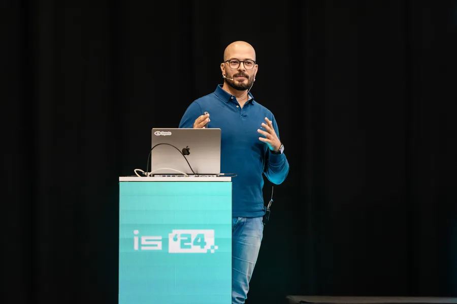 Medhat Dawoud speaking at a conference